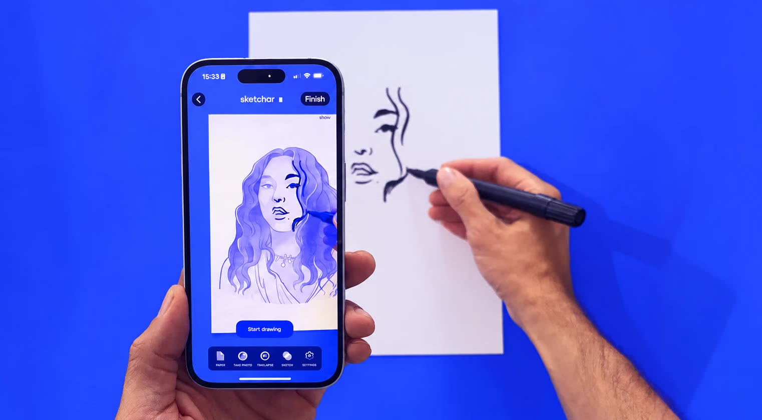 Drawing with Sketchar: the phone traces the sketch onto paper